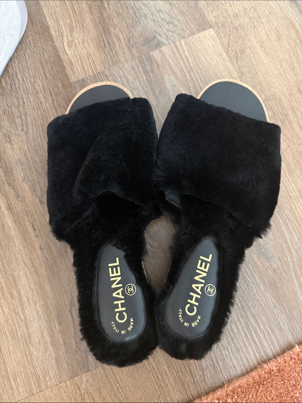 CHANEL Black Fur Slide Slippers with Gold Logo
